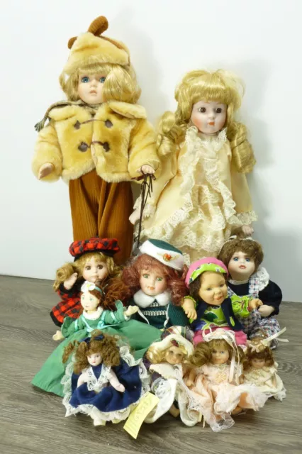 Lot of 11 Bisque Porcelain Cloth Jointed Doll Figurines American Mint DanDee