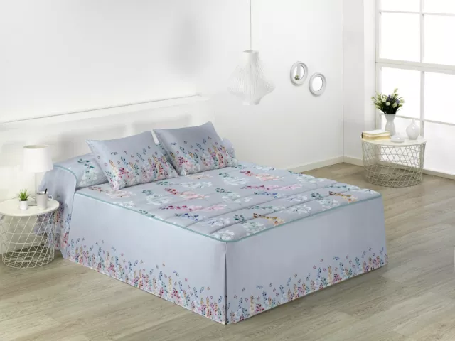 edredon de volante  invierno cama 150 180  marca JVR  105 135 con flores 90