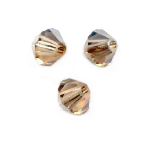 20 Perles Toupies 4mm cristal Swarovski  LIGHT COLORADO TOPAZ SATIN