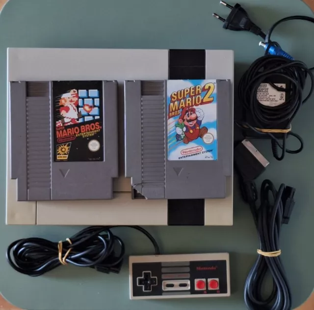 Nintendo NES + Cables Nintendo + 1 Manette + 2 Jeux