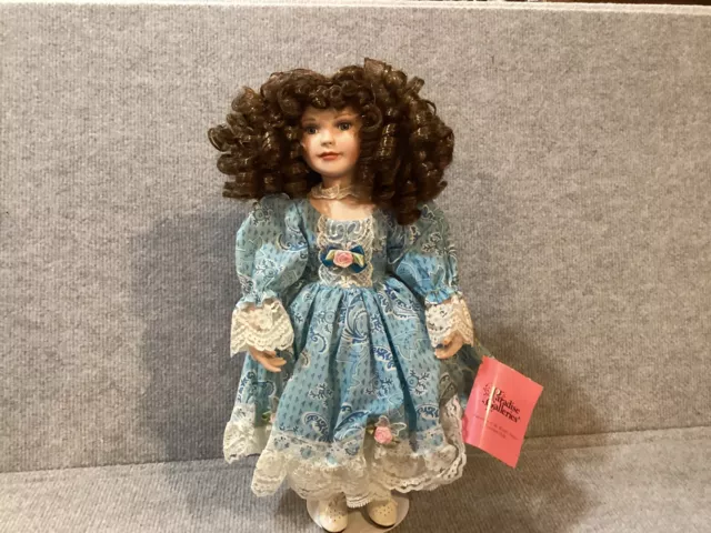 *Paradise Galleries Treasury Collection 14” Porcelain Doll in Blue Dress
