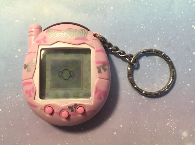 Vintage 2004 Tamagotchi Connection V3 Pink Bows Ribbons Bow TESTED Vintage 2004 Tamagotchi Connection V3 Pink Bows Ribbons Bow TESTED