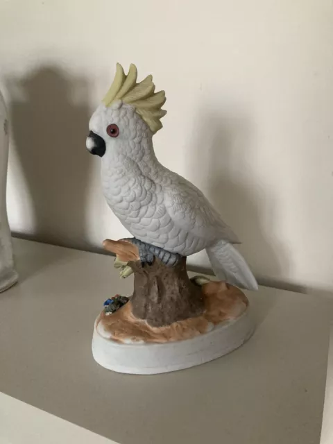 vintage Cockatoo figurine Bisque china marked B and leaves 20cm Med parrot VGC