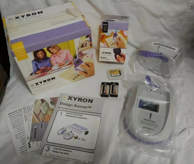 Xyron Design Runner handheld printer w/ ink, disc, dock opened box new Xyron Design Runner handheld printer w/ ink, disc, dock opened box new