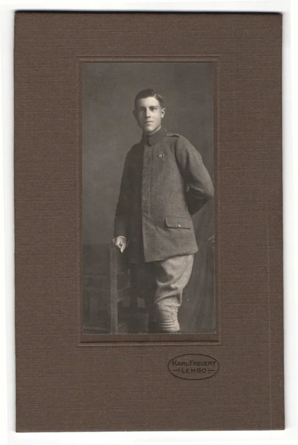 Photography Karl Frevert, Lemgo, young man with side top wears uniform and