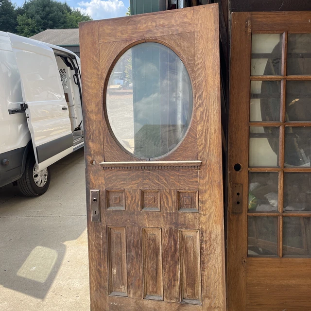 An 685 1/4 sawn Oak oval entrance door 35 5/8 x 79. Five