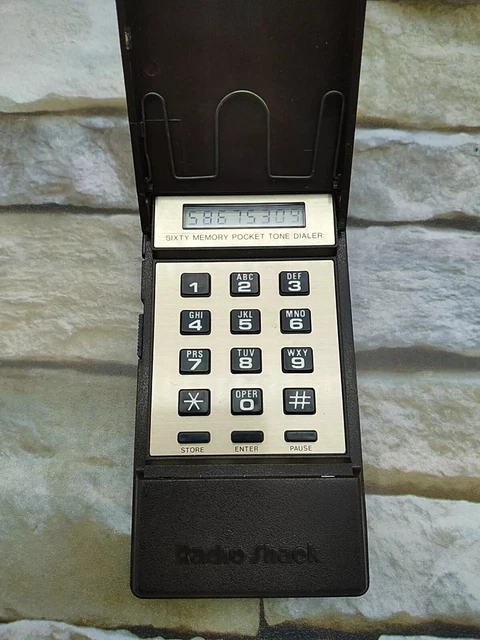 TEXAS INSTRUMENTS POCKET DIALER I-0490 Guide