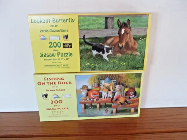 Lot of 2 Complete 300 & 200 Piece SunsOut Puzzles. Colt and Dogs Fishing.