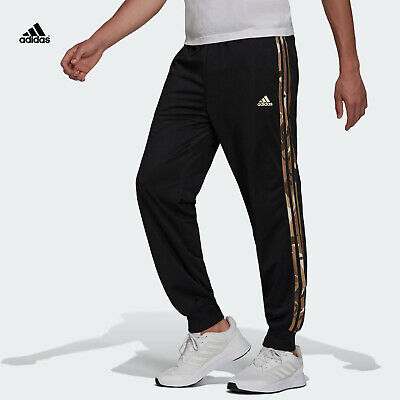 essentials warm up tapered 3 stripes track pants