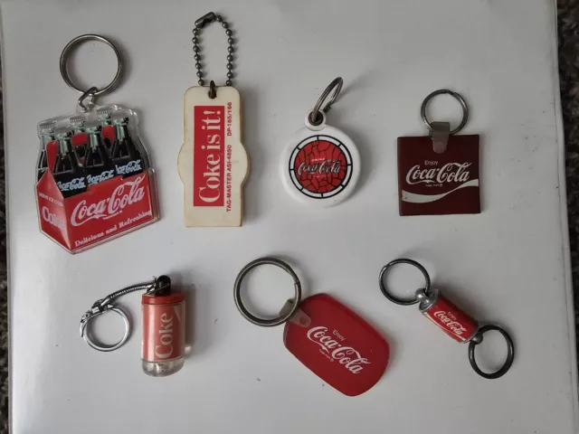 Lot Of 7 - Vintage 1990s Coca-Cola Keychains opener, mirror / photo holder