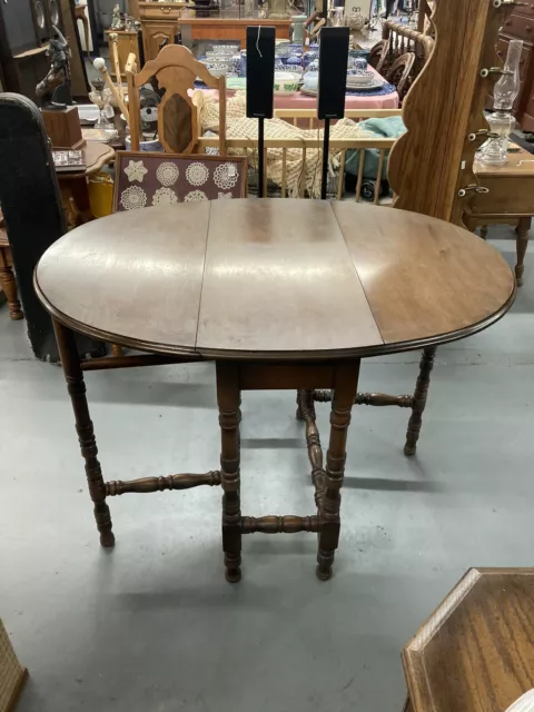 Antique Imperial Gate Leg Table Drop side Leaf Oval with Long center Drawer