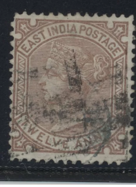 IND Queen Victoria 12 anna venetian red stamp (SG82) from India dated 1876