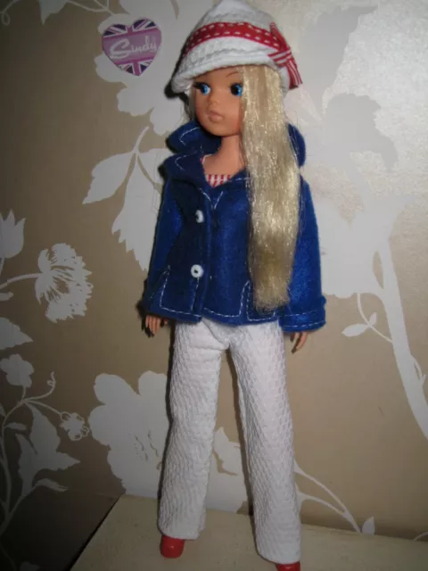 Vintage Sindy doll, original long hair,white pants and hat, blue jacket, red mul