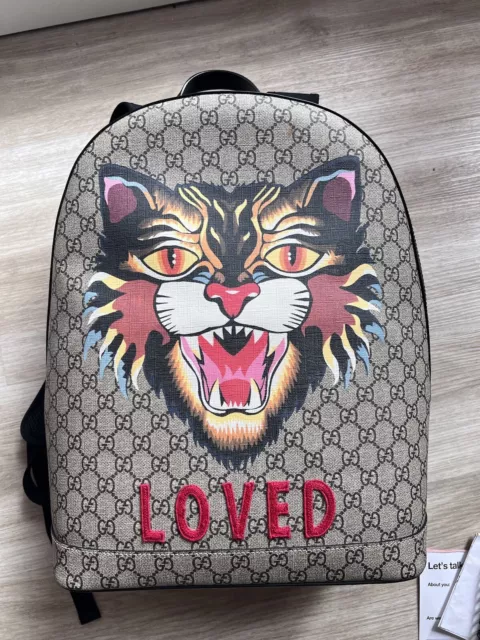 Gucci backpack lion sales