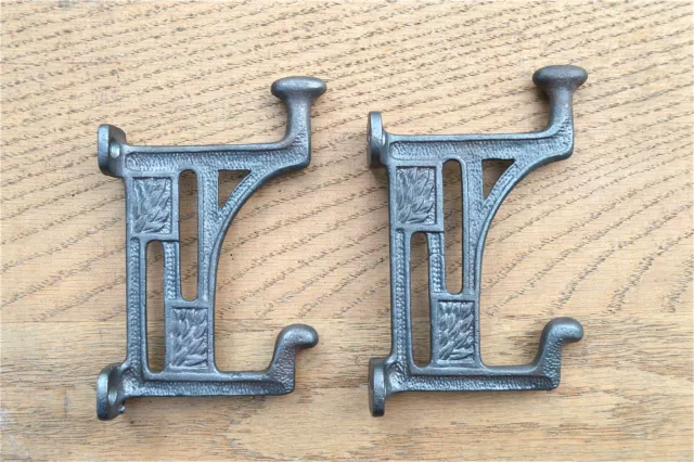 Pair Arts & Crafts Mackintosh Glasgow coathooks cast iron coat hook door hanger