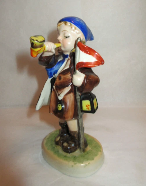 VINTAGE CERAMIC BOY Blowing Horn Figurine Holding Flag & Lantern Made