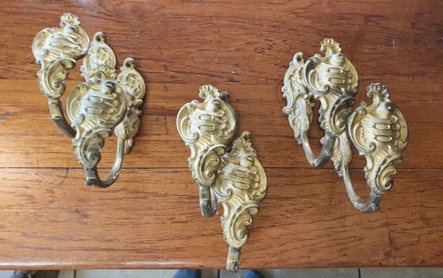 Set of 3 pairs of antique ormulu curtain tie back brackets