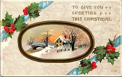 Christmas Greetings Snowy Cabin And Bridge Holly c1911 Embossed Postcard