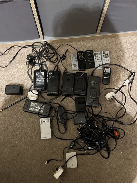 Bundle Of Camcorder Power Supply And Remotes