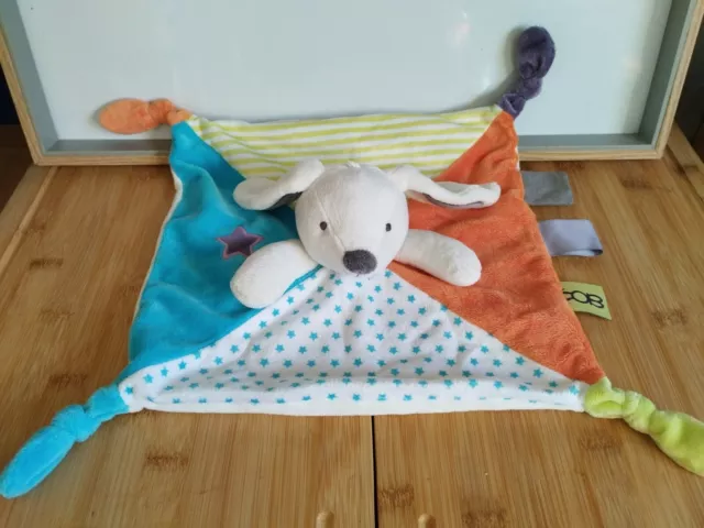 Doudou plat lapin blanc orange bleu jaune étoiles Obaibi