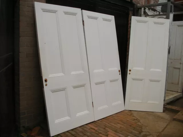 Very large and heavy reclaimed Victorian 4 panel pine doors