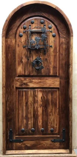 Rustic reclaimed solid lumber arched Doug Fir old growth door winery castle