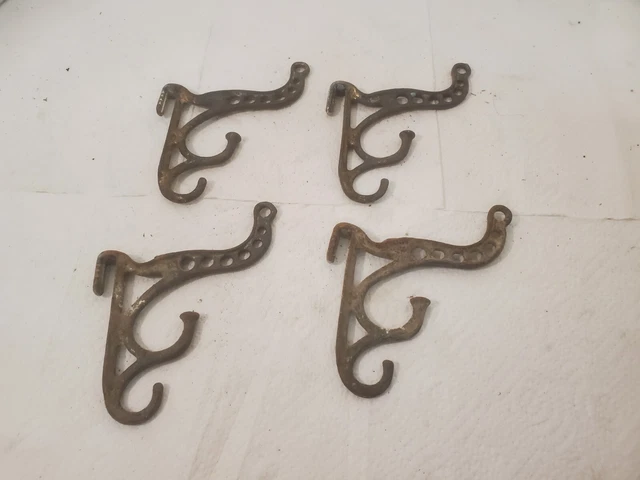 4 small cast iron coat hat hooks 5" tall store display ornate