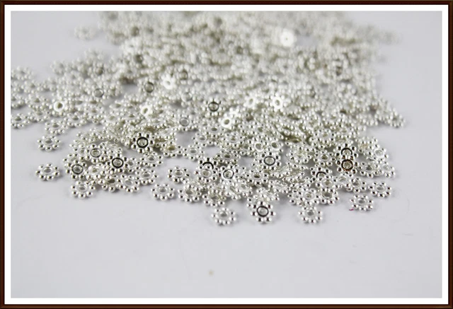 100 Stern Blume Zwischenperle 4 x 1,5 mm Daisy Spacer silber Metallperlen Engel