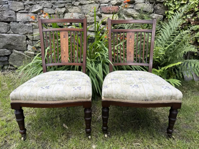 A Pair Of Edwardian Mahogany And Inlaid Low Chairs.