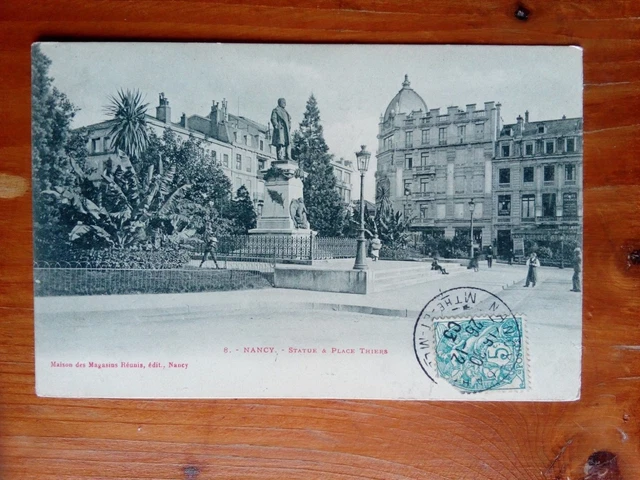 Cpa 54 NANCY statue et place Thiers animée