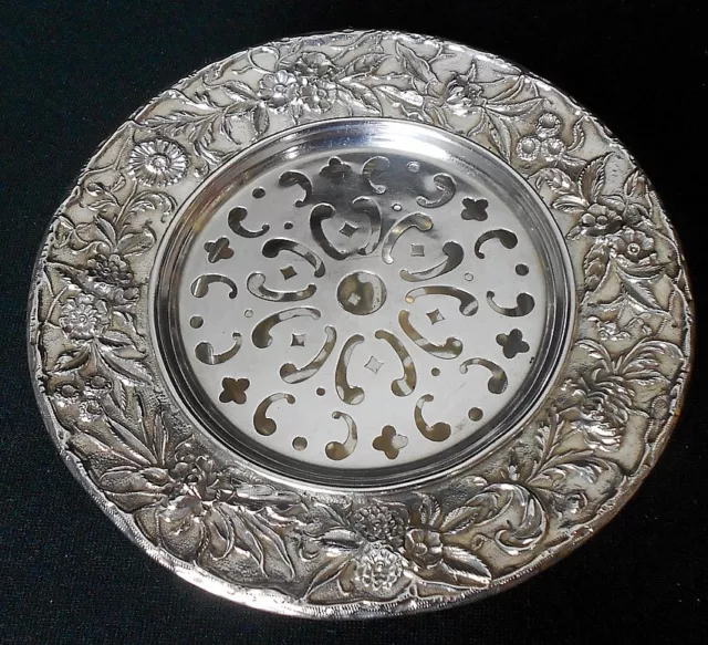 A sterling silver open repousse butter dish, S.Kirk & Son, Inc., Baltimore.