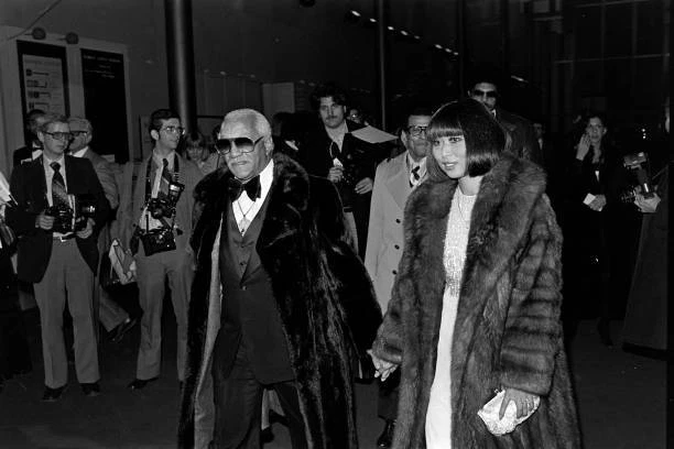 REDD FOXX AND Yun Chi Chung attend a party at the Kennedy Cen- 1977 Old