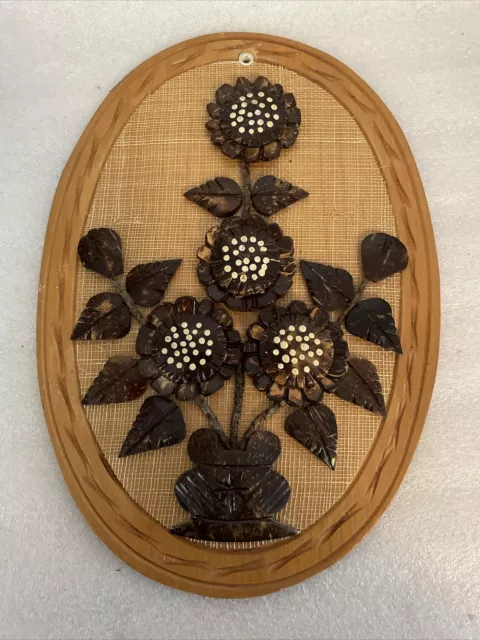 Unusual Vintage hand Carved Coconut Shell Wall Art depicting a floral scene