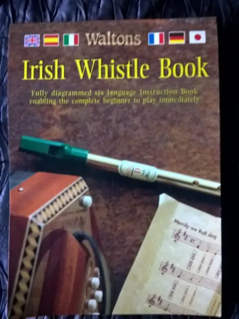 Waltons Irish whistle music book .  Diagrammed 6 language instruction book