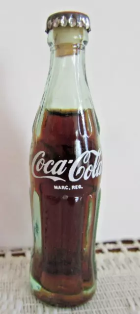 Coke Coca Cola Collectable 3" Glass Bottle Liquid & Cap. 35 Years Old. Red Label