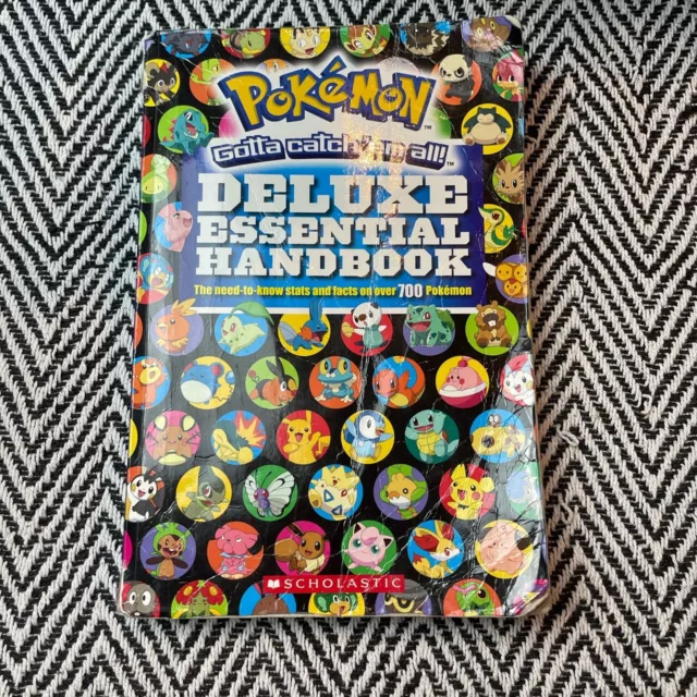 Pokemon: Deluxe Essential Handbook (Paperback, 2015) Preowned