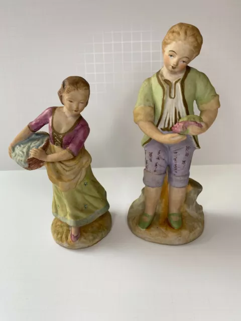 Vintage bisque porcelain figurines pair Girl basket Boy grapes boy 7.5"
