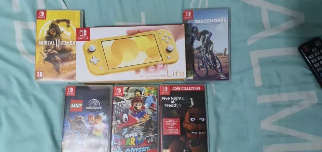NINTENDO SWITCH LITE Boxed YELLOW Bundle 5 games and hard case