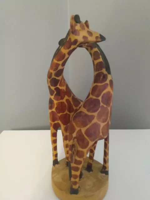 Carved Wooden Giraffes Entwined