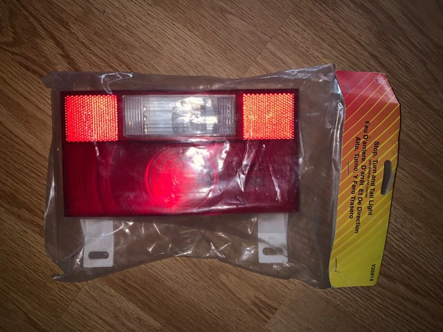 Peterson V25914 Stop/Turn/Tail with Backup Light and License Hanger - NEW
