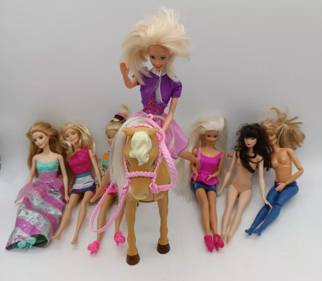 Barbie - Konvolut mit 7 Puppen und Pferd