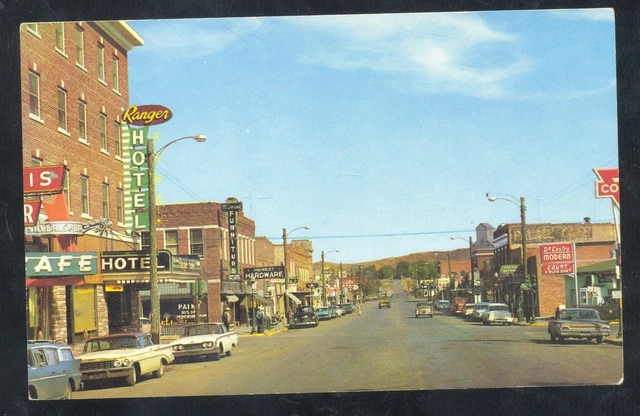 LUSK WYOMING DOWNTOWN STREET SCENE 1960's CARS STORES VINTAGE POSTCARD
