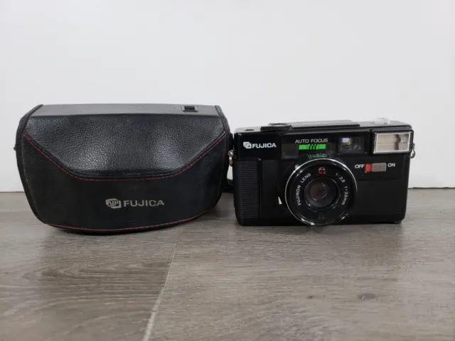 Fujica Auto-7 Black Handheld Auto Focus 38mm Camera AS IS PARTS OR REPAIR ONLY