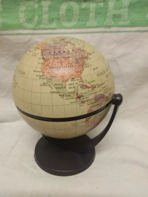 Globo mundial en miniatura giratorio de dos vías.