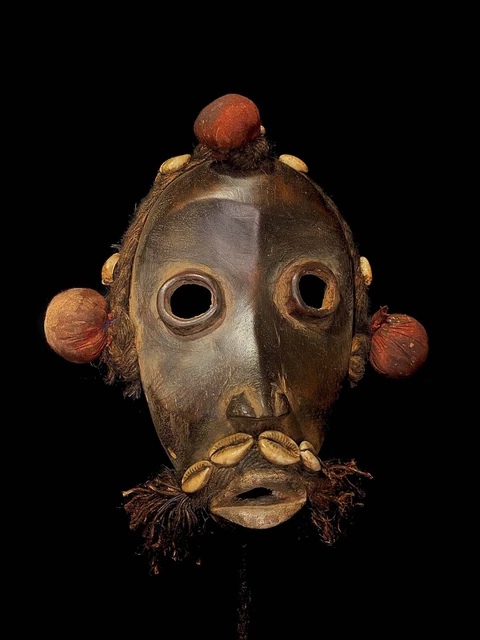 African mask from the Dan tribe with shells and a special handmade fabric-4931