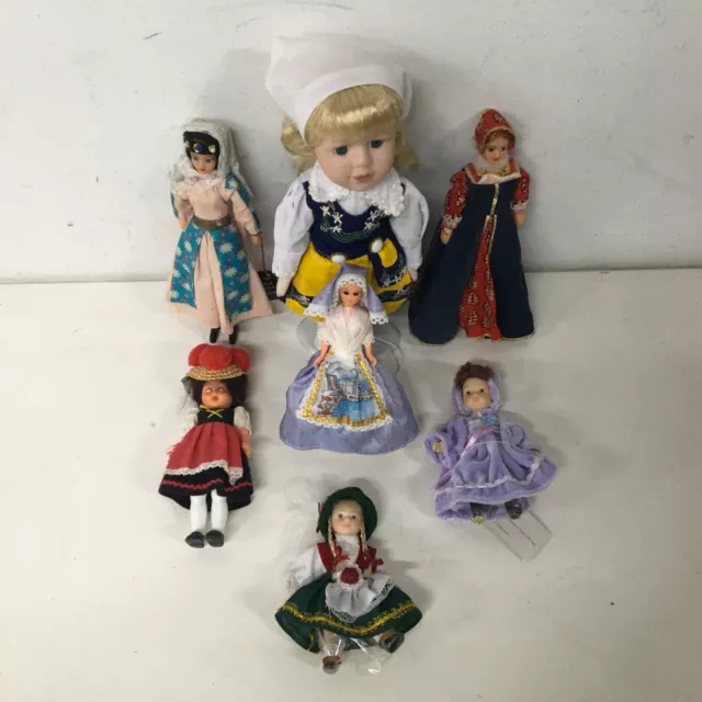 Collection of 7 Small Plastic & Ceramic Dolls In Traditional Clothes (10) #419