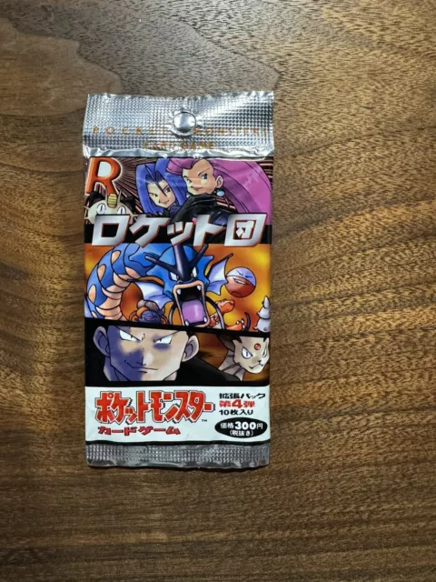 Pokémon TCG Team Rocket Booster Pack (Wrapper Only No Cards)