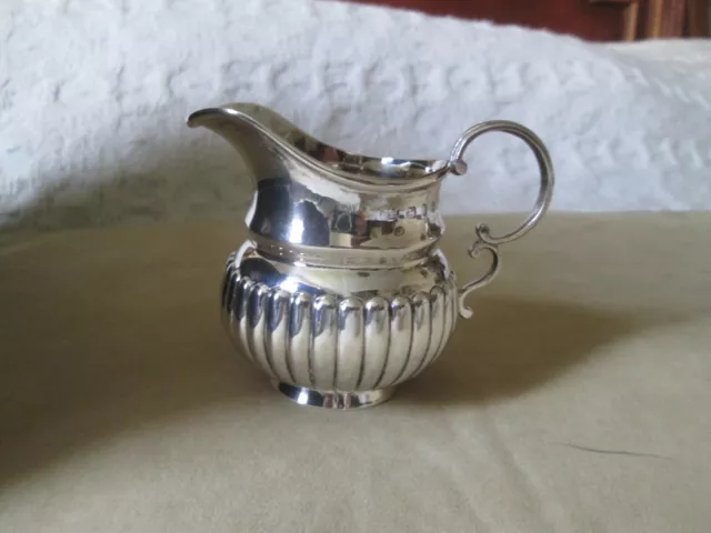 sterling silver cream / milk jug