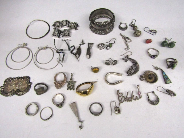 MIXED LOT OF STERLING EARRINGS, PENDANTS, RINGS MISC.- 157 Grams