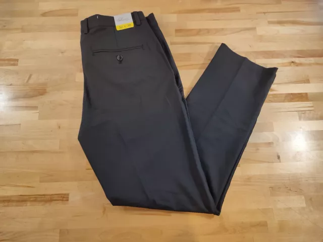 Men's Greg Norman Signature 4-Way Stretch 5 Pocket Travel Pant 32Wx30L Black